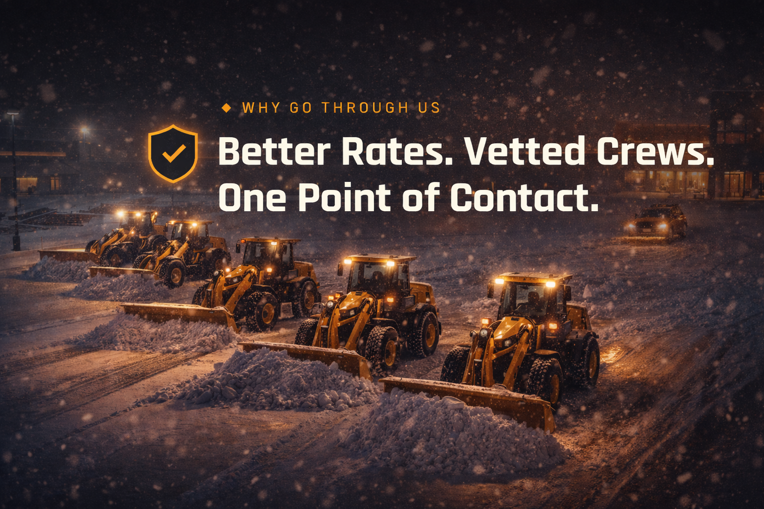 Fleet of yellow loaders clearing snow at night in Ottawa